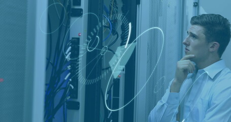 Poster - Caucasian male, looking thoughtful in server room