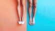 Two pairs of legs, one with white heels on orange background, barefoot blue background
