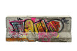 Piece of concrete full of colorful graffiti over white transparent background