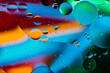 © kosoff - Colorful abstraction of oil bubbles in water. View from above. Macro photography.