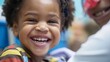 Closeup of a young child smiling happily as they receive gene therapy treatment a symbol of hope and potential for a brighter healthier future. .