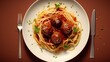 Delicious spaghetti and meatballs on white plate isolated on a table.
