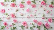 Behold the beauty of spring blooms Picture delicate pink flowers set against a pristine white wooden backdrop in a flat lay style captured from a captivating top down view with ample copy s