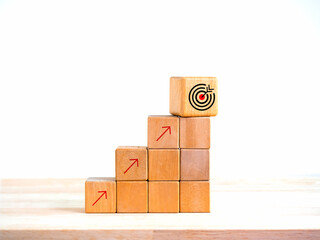 Poster - Arrow upward to the target icon symbol on wooden cube blocks, bar graph chart steps on white background, profit planning, marketing passive income, business growth process concepts, minimal style.