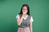 Fototapeta  - Sick young Asian woman feeling unwell and coughing as symptom for cold or bronchitis.
