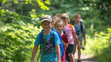 Fototapeta  - Children embarking on a wilderness hike during summer camp
