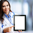 Portrait of happy smiling female doctor show tablet pc with blank copy space area for slogan or text, against blurred modern office background. Medical call center concept. Square image