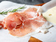 Prosciutto and rosemary on plate	