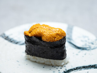 Poster - Sea urchin roe sushi on a plate