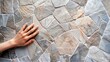Mock up from natural stones top view close up Female hands advertises repair materials Floor tiles tiles countertops : Generative AI