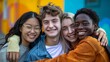 © sorin - Multiethnic best friends. group of happy freshmen students embracing, multiracial friendship concept