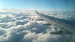 Airplane Wings: A photo of a commercial airplane wing during takeoff, with the sky and clouds in the background