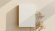 © Generative AI - White book blank cover mockup on a beige background with dry flower flat lay mockup : Generative AI