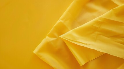 Poster - top view with yellow empty kitchen napkin isolated on table background Folded cloth for mockup with copy space Flat lay Minimal style : Generative AI