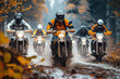 male motorcycle racers on sports enduro motorcycles compete in an off-road race riding on muddy road in forest