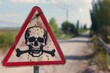 Deadly poison. Road side icon warning sign with skull and cross bones .