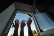 Mannequin hands against the background of an open window