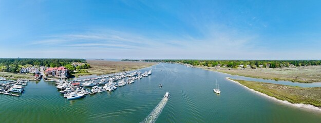 Wall Mural - Aerial view of a lake with multiple boats.