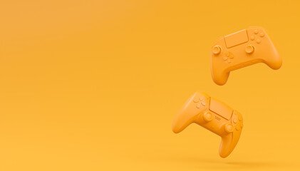 Canvas Print - Video game joysticks or gamepads in plain monochrome yellow color background