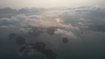 Wall Mural - Aerial view of Khao Sok national park at sunrise, in Cheow lan lake, Surat Thani, Thailand