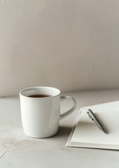 Wall Mural - A Cup of Coffee and a Notebook on a Bed