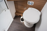 Fototapeta Panele - RV Motor Home Toilet Bowl Inside a Bathroom