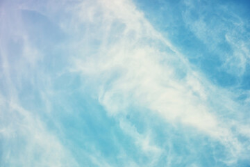Wall Mural - High clouds in the summer sky. Sky background. Meteorological observations of the sky.