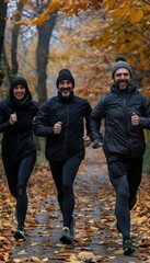 Wall Mural - Happy group of friends in athletic wear joyfully jogging in morning at park setting