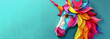 A colorful unicorn made of colored paper with a blue background. The unicorn is surrounded by pink, yellow, and purple feathers. colorful unicorn.