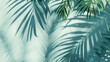 Abstract background of fresh palm leaves and shadows on the wall	
