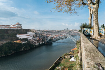 Wall Mural - View of the Dom Luis I bridge, a two-story metal arch bridge spanning the Douro River between the cities of Porto and Vila Nova de Gaia, Portugal.