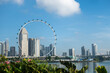 Singapore skyline with blue cloudy sky