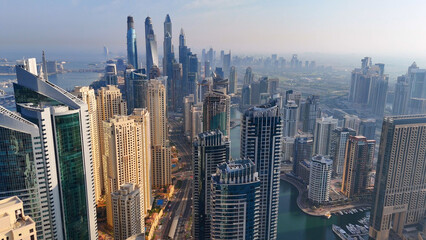 Aerial view of Dubai Marina. Dubai Marina is an affluent residential neighborhood known for The Beach at JBR.	