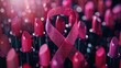 Pink lipstick ribbons symbolizing breast cancer awareness surrounded by bokeh lights