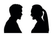 Side profile of young man and young woman talking and looking to each others black silhouettes.