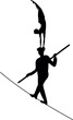 Silhouette of ropewalker on rope. Circus artists on a white background.
