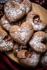 Wall Mural - food photo,Nutella-filled cookies arranged in a heart shape. cookbook style, nutella day banner сreated with Generative Ai