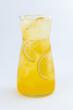 Homemade lemonade with lemons and ice