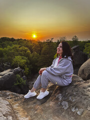 Poster - happy woman enjoying sunset above carpathian mountains