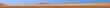 Extreme panoramic picture of the red dunes of the Namib Desert in Namibia against a blue sky in the evening light