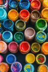 Sticker - Close up of a bunch of paint cans, perfect for DIY projects