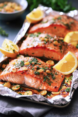 Fish baked salmon fillet on aluminum foil, fish for healthy dinner