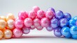 Balloon arch in pastel colors for party decoration on white background, 4k, ultra hd