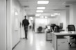 © john - office in white blurry background subtle people blurry