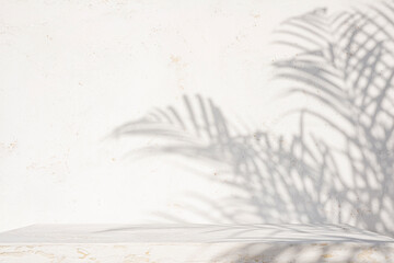 Wall Mural - empty aged white painted table top for product display with palm leaf shadows on abstract texture wa