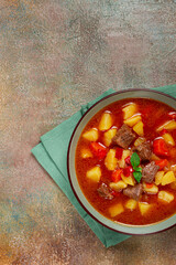 Wall Mural - meat goulash, with potatoes and carrots, sweet pepper, traditional Hungarian soup, homemade, no people,