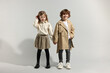 © New Africa - Fashion concept. Stylish children posing on light grey background