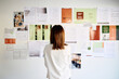 © Guille Faingold/Stocksy - Businesswoman evaluates project plans