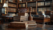 A stack of books and a wooden gavel on a table in a library