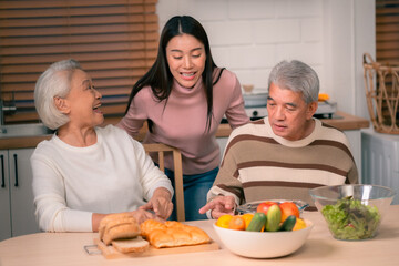 Wall Mural - Asian Family Happiness in the Kitchen: Senior Parents Cooking Dinner with Joy, Children Laughing, A Fun and Loving Atmosphere of Togetherness, Creating Delicious Meals and Beautiful Memories